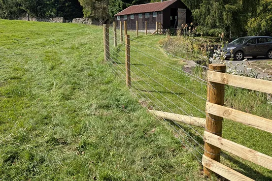fence running round a corner