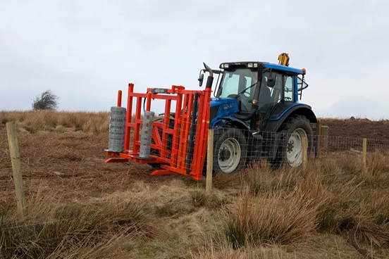 tractor doing fencing work